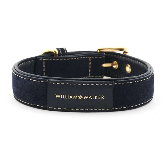Dark blue suede leather dog collar with white stitching and brass hardware by William Walker