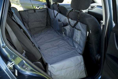 Henry Wag Pet Car Seat Hammock installed in car rear seat protecting upholstery with durable waterproof fabric