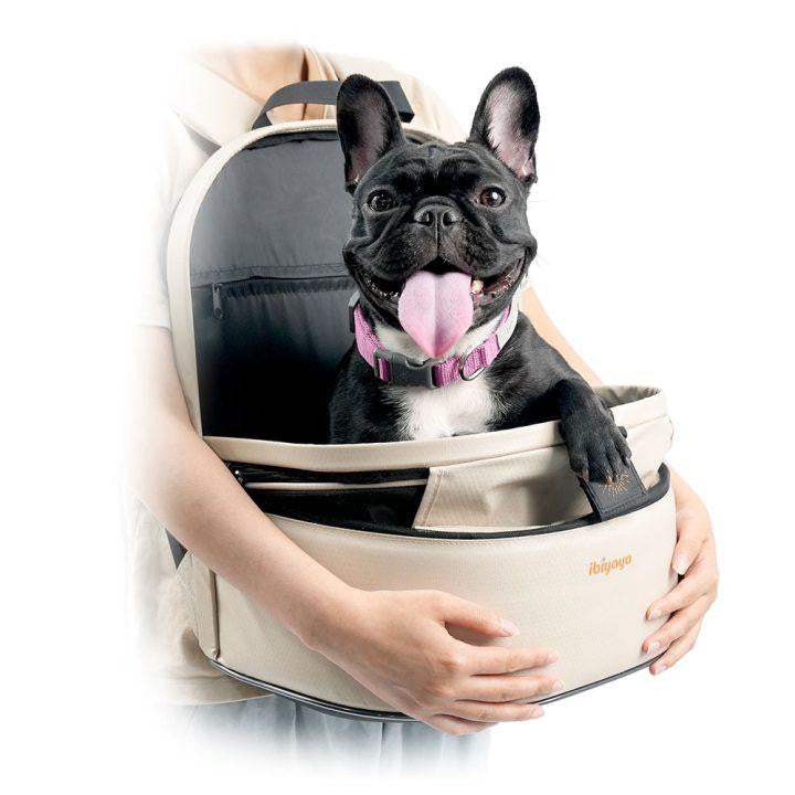 Ibiyaya Panorama zipper-free small pet travel carrier in buttermilk color with ergonomic backpack, chest carry, and wheeled transport options