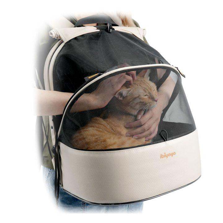 Small pet travel carrier with ergonomic, zipper-free design and airline-approved features in buttermilk color