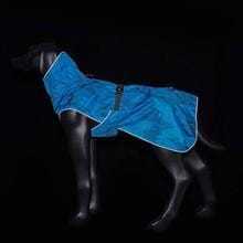 Icepeak Sprint Raincoat in bright orange and aqua colors for dogs, lightweight and waterproof with adjustable fit and taped seams