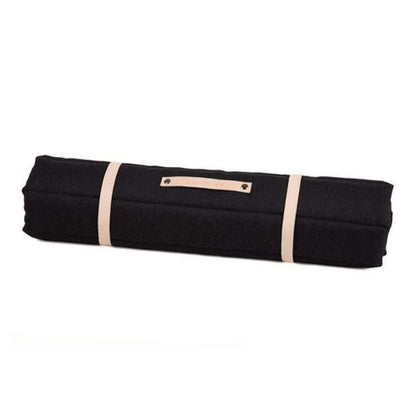 FOSSER Dog Travel Bed by Labbvenn rolled up with leather straps in four colors for comfortable travel