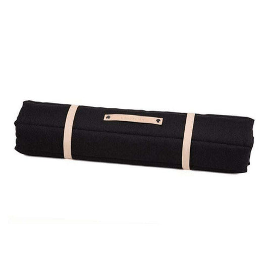 FOSSER Dog Travel Bed by Labbvenn rolled up with leather straps in four colors for comfortable travel