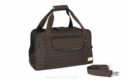 Black Muffin & Berry travel carrier for pets with breathable mesh panels and secure zip closure