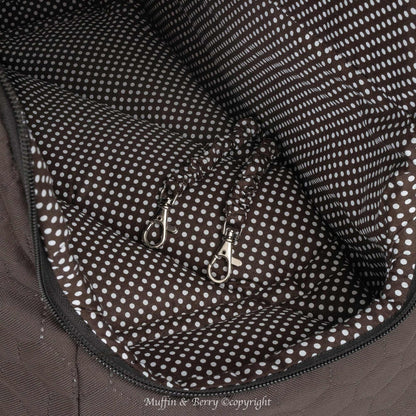 Black Muffin & Berry travel carrier for pets with breathable mesh panels and secure zip closure