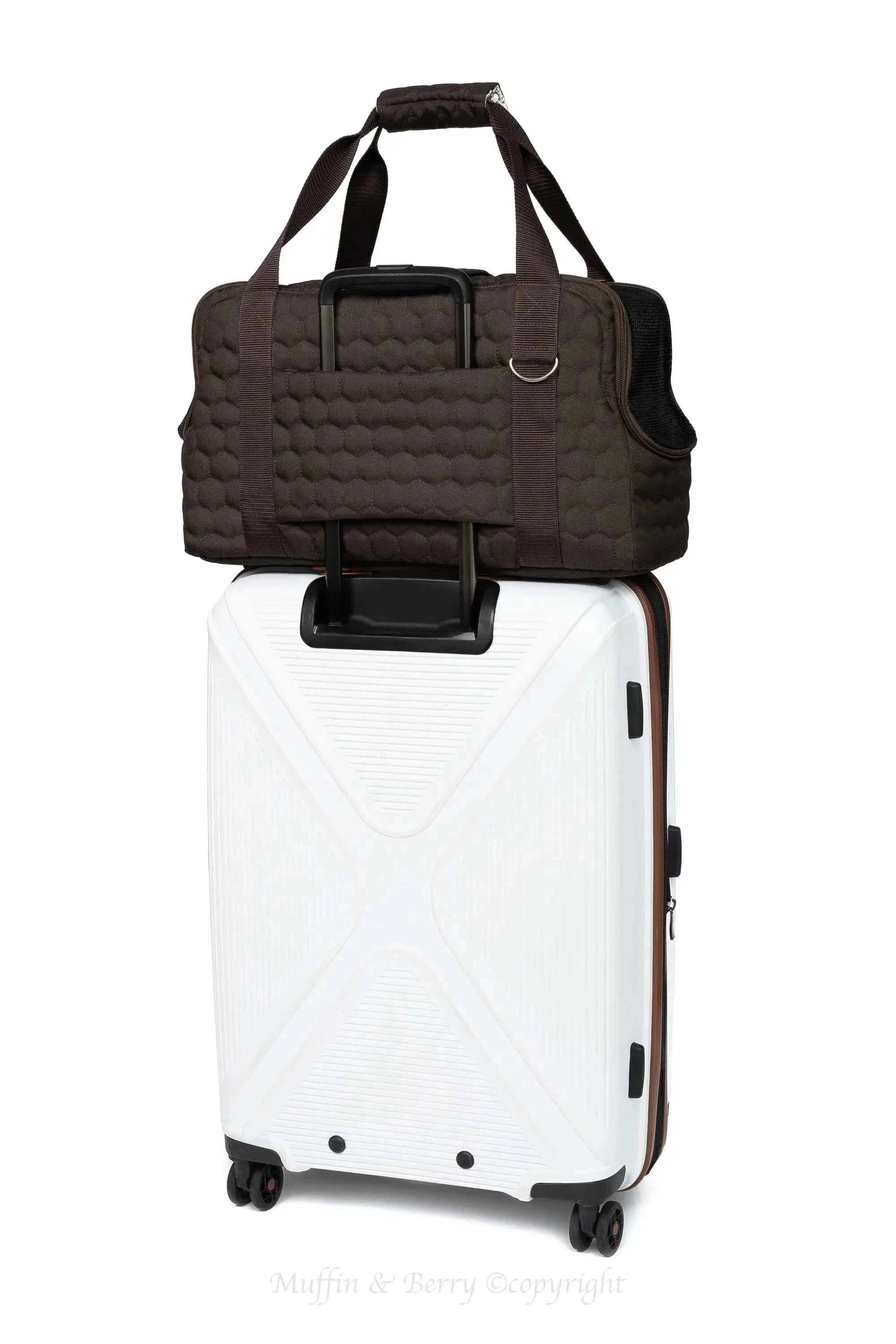 Black Muffin & Berry travel carrier for pets with breathable mesh panels and secure zip closure