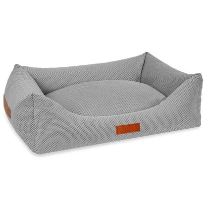 Orthopedic memory foam dog bed with grey knitted upholstery for ultimate comfort and support