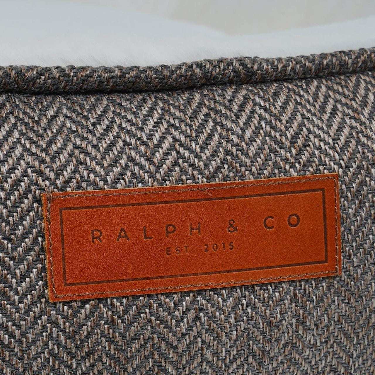 Ralph & Co Tweed Calming Donut Dog Bed Lincoln in herringbone tweed with soft faux rabbit fur lining for anxiety relief and comfort