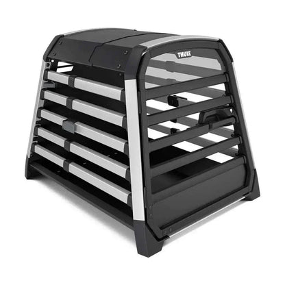 Thule Allax black crash-tested dog car crate secured in car boot with adjustable depth and gas-dampened door
