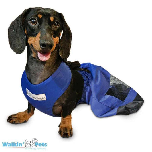 Walkin’ Drag Bag in bright blue nylon with mesh panel to protect dogs' chest and rear legs from scraping and sores.
