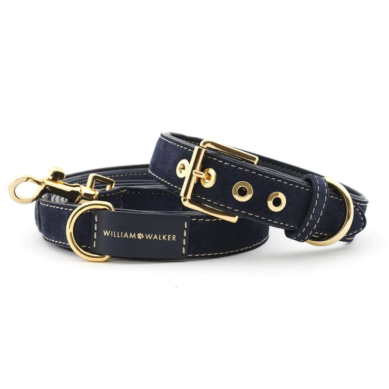 Dark blue suede leather dog collar with white stitching and brass hardware by William Walker